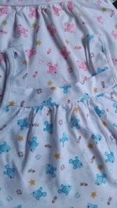 (แพ็ค 10ตัว)(แพ็ค 5 ตัว)เสื้อผูกหน้า-เสื้อผูกหลังเด็ก ขนาดมาตรฐาน 0-3 เดือน ผ้า cotton คละสี (ลายด้านหน้าเปลี่ยนไปตามรอบการผลิต)