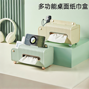 กล่องใส่กระดาษหนังสือพิมพ์บนโต๊ะพร้อมแท่นวางโทรศัพท์มือถือและจุกเกอร์สำหรับนำเข้าจากจีนแผ่นดินใหญ่