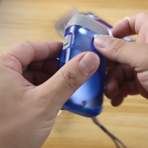 Mini Portable LED Hand Crank Flashlight - Transparent Self-Powered No Batteries Outdoor Emergency Light with Lanyard