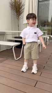 Quần short kaki ngố phối túi sau ốp tag họa tiết cậu bé đi chơi đi học 9 tới 28kg BERNIE H1224Q24