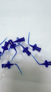 Blue Dental Syringe Tips for Tooth Filling Application. Key attributes: disposable precision medical-grade.