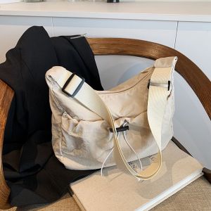Trendy Folded Drawstring Large Capacity Canvas Bag Womens Crossbody Shoulder Bag for Commuting And Classes Casual Style