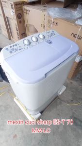 Mesin Cuci Dua Tabung Sharp 6.5 Kg ES T70MW\\n\\n Apa Itu Mesin Cuci Dua Tabung Sharp?\\n\\nMesin cuci dua tabung Sharp 6.5 kg ES T70MW adalah mesin cuci yang memiliki dua tangki terpisah untuk proses pencucian dan pengeringan. Dengan kapasitas 6.5 kg, mesin cuci ini mampu membersihkan pakaian Anda dengan efektif dan efisien.\\n\\n Kelebihan Mesin Cuci Sharp\\n\\nBerikut beberapa kelebihan dari mesin cuci dua tabung Sharp:\\n\\n- Efisiensi energi: Mesin cuci Sharp dirancang untuk menghemat energi, sehingga dapat membantu mengurangi biaya listrik bulanan Anda.\\n- Desain modern: Mesin cuci Sharp memiliki desain yang stylish dan modern, cocok untuk berbagai ruang laundry.\\n- Tahan lama: Mesin cuci Sharp dibuat dari bahan berkualitas tinggi, sehingga dapat bertahan lama dan memberikan performa yang konsisten.\\n\\n Desain Modern Mesin Cuci Sharp\\n\\nMesin cuci dua tabung Sharp dirancang dengan desain modern yang minimalis dan elegan. Desain ini membuat mesin cuci menjadi bagian integral dari dekorasi rumah Anda, tanpa mengganggu keindahan ruangan.\\n\\n Mesin Cuci Efisien Energi\\n\\n Bagaimana Mesin Cuci Efisien Energi Bekerja?\\n\\nMesin cuci efisien energi seperti Sharp ES T70MW dirancang untuk menghemat energi dengan cara berikut:\\n\\n- Penggunaan teknologi hemat energi: Mesin cuci ini menggunakan teknologi terbaru untuk mengurangi konsumsi energi selama proses pencucian.\\n- Pilihan program pencucian hemat energi: Mesin cuci Sharp ES T70MW menawarkan berbagai program pencucian yang dirancang untuk menghemat energi.\\n\\n Keuntungan Menggunakan Mesin Cuci Efisien Energi\\n\\nMenggunakan mesin cuci efisien energi seperti Sharp ES T70MW memiliki beberapa keuntungan:\\n\\n- Hemat biaya listrik: Dengan penggunaan energi yang lebih efisien, Anda dapat mengurangi biaya listrik bulanan Anda.\\n- Ramah lingkungan: Mesin cuci efisien energi membantu mengurangi emisi gas rumah kaca, sehingga lebih ramah lingkungan.\\n\\n Mesin Cuci Tahan Lama\\n\\n Kualitas Material Mesin Cuci Sharp\\n\\nMesin cuci dua tabung Sharp dibuat dari bahan berkualitas tinggi, seperti stainless steel dan plastik tahan lama. Hal ini membuat mesin cuci lebih tahan lama dan dapat bertahan dalam jangka waktu yang panjang.\\n\\n Perawatan Mesin Cuci Sharp\\n\\nUntuk menjaga mesin cuci dua tabung Sharp agar tetap berfungsi dengan baik, Anda perlu melakukan perawatan secara rutin. Beberapa tips perawatan mesin cuci Sharp antara lain:\\n\\n- Bersihkan filter secara berkala: Filter pada mesin cuci perlu dibersihkan secara berkala untuk mencegah penyumbatan.\\n- Gunakan pemutih yang tepat: Pemutih yang tidak tepat dapat merusak mesin cuci. Pastikan Anda menggunakan pemutih yang sesuai dengan mesin cuci Sharp.\\n\\n Kesimpulan\\n\\nMesin cuci dua tabung Sharp 6.5 kg ES T70MW adalah pilihan yang tepat untuk Anda yang mencari mesin cuci efisien energi, desain modern, dan tahan lama. Dengan berbagai kelebihan yang ditawarkan, mesin cuci ini akan menjadi asisten yang efektif dalam membersihkan pakaian Anda.\n}