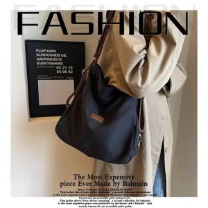 Nqshop โปรโมชั่น กระเป๋าสะพายข้าง ทรงบักเก็ต ขนาดใหญ่ จุของได้เยอะ ดีไซน์เรียบง่าย แต่ดูดี หยิบแมทช์ง่าย ใช้งานได้ทุกวัน มีมาให้เลือก 2 สี ดีเทลดีไม่ไหว