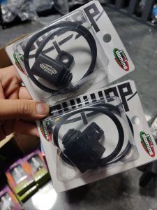 Domina 3 way domino switch with black cable and connector in clear plastic packaging.
