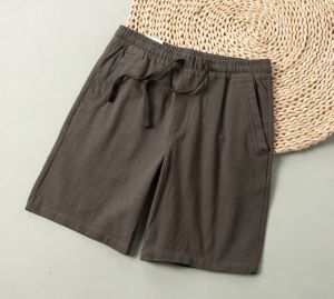 กางเกงขาสั้นผ้าลินินทรงหลวมสไตล์อเมริกันสำหรับผู้ชาย กางเกงขาสั้นชายหาดทรงห้าส่วน สวมใส่สบาย ลำลอง ฤดูร้อน