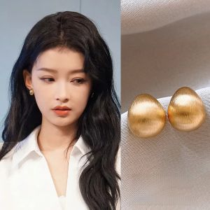 Elegant Golden Bean Stud Earrings Womens Fashion Jewelry Lightweight Luxury Sensation Metal Hoops Fresh out New Model