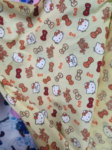 ผ้าคอตตอนทีซี ลายการ์ตูน คิตตี้ แมว หน้ากว้าง 45 นิ้ว ผ้าเมตร คอตตอน ถ่ายพร็อพ ฉาก ปูโต๊ะ