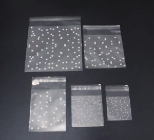 100pcs Plastic Transparent Cellophane Candy Bags Self Adhesive White Polka Dot Candy Cookie Gift Bags For Wedding Birthday Party