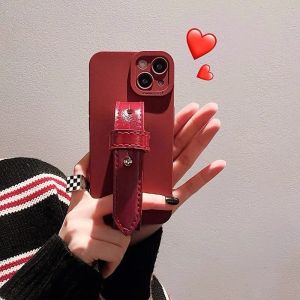 เคสโทรศัพท์มือถือแบบมีสายรัดข้อมือสีแดงไวน์หรูหราสำหรับ Apple 17promax 15pro 16pro 13 สำหรับผู้หญิง 12/11 14pro 11 เรซิน