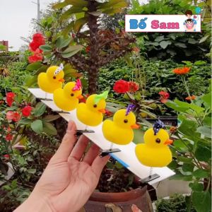 Kẹp tóc Vịt vàng đeo nơ đội mũ bông hoa cho bé gái dễ thương Hàn Quốc Shop Bố Sam