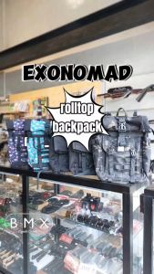 Exonomad Flamingo Backpack Roll Top 24 liters capacity Sports Bag with teal and pink flamingo pattern black straps and buckles