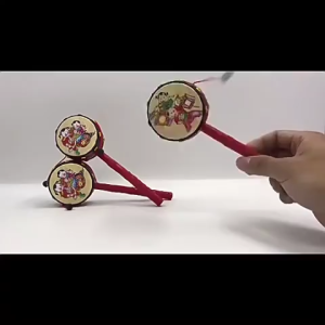 Mainan Bolanggu Imlek Spinning Drum - Hiasan Lucu dengan Suara Tak Tak Tak