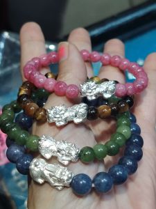 Silver Piyao 925 Bracelet with Pink Brown Green Blue Beads and Silver Piyao Charm.