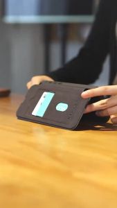 Ốp Lưng Bao Da Gập Nillkin Qin Prop Leather Chống Sốc Cho iPhone 16 Pro Max Đựng Thẻ Nắp Đậy Bảo Vệ Camera Kiêm Giá Đỡ