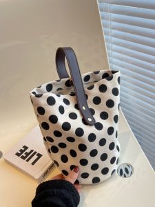 กระเป๋าทรงถังความจุขนาดใหญ่ เรียบง่าย กระเป๋าถือผ้าแคนวาส ผู้หญิง ลำลอง กระเป๋าสะพายไหล่ สีตัดกัน หัวเข็มขัดแม่เหล็กสีบริสุทธิ์