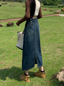 กระโปรงยีนส์ทรงเอเอวสูงสไตล์ย้อนยุคสีน้ำเงินสำหรับผู้หญิง ฤดูใบไม้ร่วง/ฤดูหนาว กระโปรงยาวทรงเอเปิดหน้าด้านข้าง กระโปรงทรงเอ ชุดเดรส