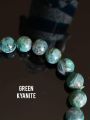 🍀 สร้อยหินไคยาไนต์  สีเขียวอมฟ้า สวยมากๆ ( Green  Kyanite ) 

 สวยเหมือนสีเขียวของมรกต มีติดสีน้ำเงินนิดๆบางเม็ด เหมือนสีของน้ำทะเล 🌊 จะมีความวิบๆวับๆเวลากระทบแสงแดด จากแร่ไมก้า (mica)  ☀️

🍀 Size ลูกปัด 9.2 mm. 
🌊 ขนาดข้อมือ 16.5 cm.. 