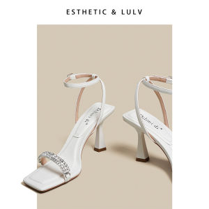 รองเท้าแตะส้นสูงสีขาวสำหรับผู้หญิงในช่วงฤดูร้อน รองเท้าแตะส้นหนาแบบสวมสบาย ดีไซน์ใหม่ปี 2025 ดีไซน์สายรัดประดับเพชร รองเท้าแตะส้นสูงสำหรับใส่กลางแจ้ง