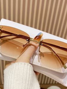 แว่นกันแดดแบบไม่มีขอบ ทรงสี่เหลี่ยม สไตล์แฟชั่น สำหรับผู้หญิง สีน้ำตาล เลนส์ PC ไม่ปรับสายตา ไม่ใช่แว่นกันแดดแบบมีขอบ