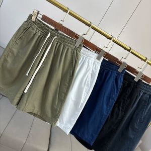 Quần Short Nam Mùa Hè Bằng Vải Lanh Cotton Rộng Rãi Thoáng Khí Thoải Mái Phong Cách Thường Ngày Dài Năm Inch Màu Trơn