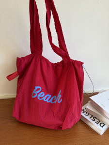 กระเป๋าผ้าใบผูกเชือกสไตล์ญี่ปุ่นขนาดใหญ่สำหรับใส่ของใช้ประจำวัน กระเป๋าสะพายไหล่ผ้าใบสำหรับเดินทางไปทำงานในช่วงฤดูร้อนปี 2025