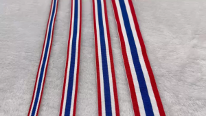 เทป ริบบิ้นผ้าลายธงชาติไทย ribbon พิมพ์ลายธงชาติไทย เทปธงชาติไทย เทปโพลี มี 4 ขนาด หน่วยขายเป็นเมตร