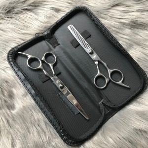 Kéo hớt tóc hiệu Kai chính hãng rất sắc bén cắt tỉa rất tiện lợi có bao da đi kèm