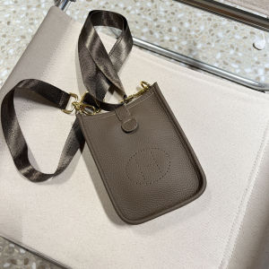 Top Layer Cowhide Mini Water Bucket Bag Pure Color Fashionable Shoulder Bag for Women With Buckle Closure