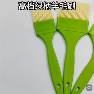 Green plastic-handled paintbrushes with natural bristles. Three sizes for different painting tasks. Suitable for wall painting and DIY projects.