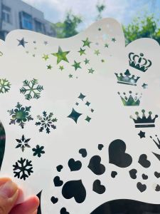 เครื่องมือวาดหน้าแบบเร็วสำหรับเด็ก รูปทรงมงกุฎ ดาว หัวใจ สnowflake แบบมีช่องว่าง เครื่องมือทาสีหน้าสำหรับเด็ก ปีใหม่ คริสต์มาส