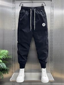 กางเกงทำงานทรงสลิมฟิตสำหรับผู้ชาย กางเกงขายาวทรงฮาราจูกุ ทรงเก้าส่วน ผ่าหน้า ผ่าข้าง ทรงลำลอง ทรงฤดูร้อน ปักลาย สีพื้น