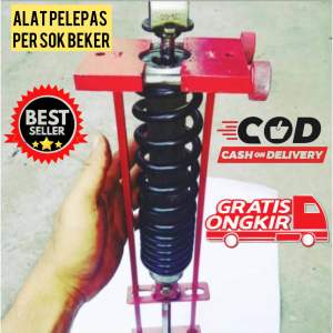 Alat Pelepas Per Shock Belakang Treker Sok Belakang