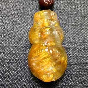 Pure natural purple titanium crystal fox-shaped good luck charm pendant. Titanium crystal and amethyst grow together. It has a very strong cats eye effect attracting wealthy people both major and minor fortune.