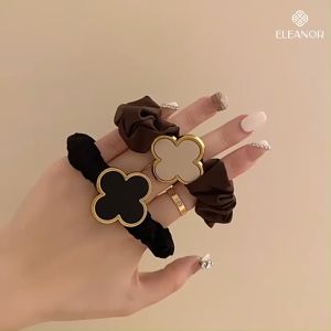 Dây buộc tóc nữ Eleanor Accessories dây cột tóc hình cỏ bốn lá may mắn phụ kiện tóc 5299