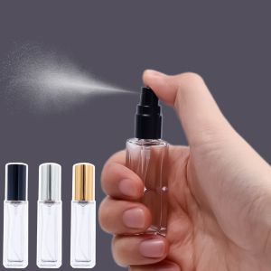 【Hoa cúc nhỏ】 10ml thủy tinh trong suốt chai nước hoa thủy tinh cầm tay bình xịt mỹ phẩm Báo Chí mini chai rỗng