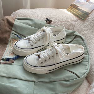 รองเท้าผ้าใบสีขาวแบบสวมสำหรับผู้หญิง ฤดูร้อน 2024 รองเท้าผ้าใบแบบสวมสบายระบายอากาศได้ดี รองเท้าแตะแบบสวมสบายสำหรับผู้หญิง