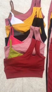 B027 -  Bộ tập quần dài ôm chỉ nổ 2 túi sau bra lệch vai phối màu có sẵn mút thể thao tập gym yoga nữ