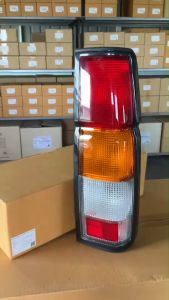 เสื้อไฟท้าย NISSAN BIG M 993ปี 1990-1995 ผ้าไฟ ปักปิด ไฟท้าย Diamond