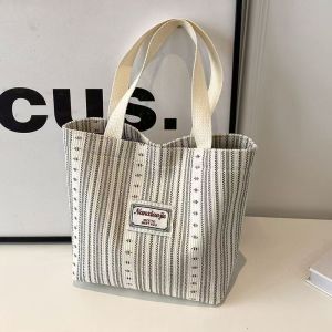 กระเป๋าผ้าใบลายทางสไตล์ญี่ปุ่นสำหรับผู้หญิง กระเป๋าสะพายไหล่แบบลำลอง กระเป๋าใส่หนังสือ กระเป๋าใส่ของสำหรับเดินทาง กระเป๋าสะพายข้างแบบลำลอง