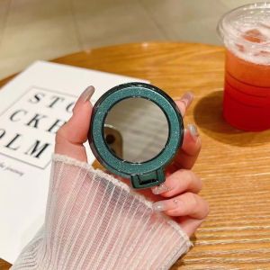 ขาตั้งกระจกแต่งหน้าพกพาที่มีแม่เหล็กสีลูกกวาด ดึงดูดโทรศัพท์มือถือแบบอเนกประสงค์ ขนาดเล็ก น้ำหนักเบา สำหรับผู้หญิง