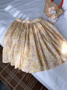 กระโปรงทรงเอเอวสูงสไตล์เกาหลี กระโปรงยาวปานกลาง กระโปรงสั้นพิมพ์ลายดอกไม้ แฟชั่นฤดูร้อน 2025 กระโปรงทรงเอเอวสูง