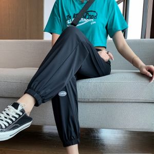 กางเกงกีฬาผ้าไหมน้ำแข็งสีชมพูสำหรับผู้หญิงในช่วงฤดูร้อน กางเกงวอร์มกันยุง กันแดด แห้งเร็ว กางเกงขายาวทรงหลวมสบาย ๆ