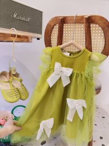 Đầm váy xanh cốm phối nơ cho bé gái