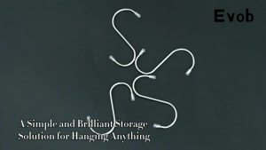 A set of durable metal S-hooks in extra large large medium and small sizes. Perfect for heavy-duty household tasks like organizing kitchen utensils or hanging clothes and cured sausages.