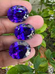 สีม่วงน้ำเงิน พลอย เพชร CZ รัสเซีย เหลี่ยมชั้น รูปไข่ CUBIC ZIRCONIA  ink blue violet 18x25 MM CARATS STEP  CUTTING  GEMSTONE STONE  1 PCS