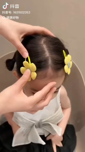 LHS.PH Flower-shaped hair clips in purple pink green yellow colors with felt petals and metal clips.
