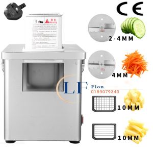 Stainless steel commercial kitchen vegetable cutter with slicing and chopping functions. Ideal for efficient food preparation in professional kitchens.