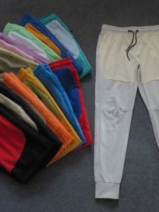 กางเกงกีฬาขายาวทรงหลวมสำหรับผู้ชาย กางเกงวอร์มลำลอง ทรงเข้ารูป สีบล็อก แฟชั่น เสื้อผ้าทำงาน ฤดูใบไม้ผลิและฤดูใบไม้ร่วง