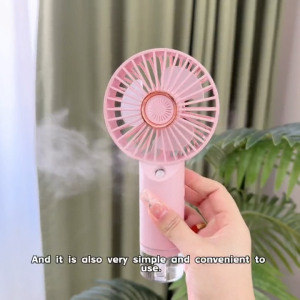 【SG]】🔥2-in-1 HandheldSpray Fan/Mini Portable Electric Fan Strong wind power long endurance USB charging desktop fan